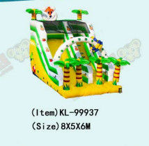 Deslizador inflable amarillo y verde con tema tropical y decoraciones de palmeras